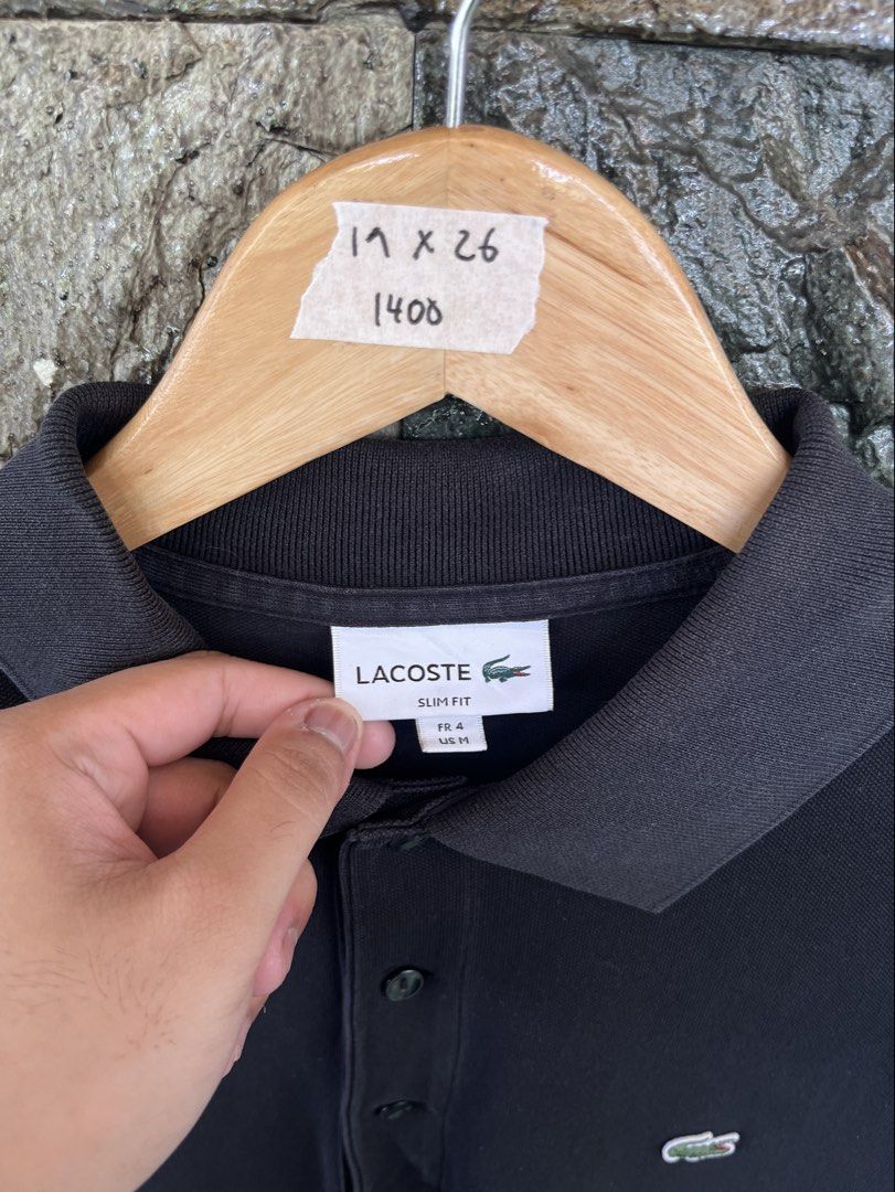 Lacoste Modern Black Poloshirt (Category: Tshirts & Polo Shirts ) located in Cagayan de Oro. Submitted by curatedheirloomph_ (Listing ID 1468235936, Image 2). Description: 𝘿𝙞𝙢𝙚𝙣𝙨𝙞𝙤𝙣𝙨: 19x26 𝘽𝙚𝙨𝙩 𝙁𝙞𝙩: Small - Medium 𝘾𝙤𝙣𝙙𝙞𝙩𝙞𝙤𝙣 & 𝘾𝙤𝙡𝙤𝙧 𝙍𝙖𝙩𝙚: Excellent (9.5/10) 𝙄𝙨𝙨𝙪𝙚: Minimal lints 𝘼𝙪𝙩𝙝𝙚𝙣𝙩𝙞𝙘𝙞𝙩𝙮 𝘿𝙚𝙘𝙡𝙖𝙧𝙖𝙩𝙞𝙤𝙣: Authentic.