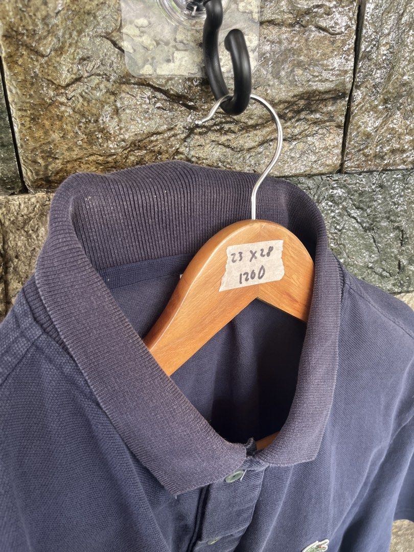 Lacoste Navy Blue Poloshirt (Category: Tshirts & Polo Shirts ) located in Cagayan de Oro. Submitted by curatedheirloomph_ (Listing ID 1468222471, Image 3). Description: 𝘿𝙞𝙢𝙚𝙣𝙨𝙞𝙤𝙣𝙨: 23x28 𝘽𝙚𝙨𝙩 𝙁𝙞𝙩: Large - XL 𝘾𝙤𝙣𝙙𝙞𝙩𝙞𝙤𝙣 & 𝘾𝙤𝙡𝙤𝙧 𝙍𝙖𝙩𝙚: Excellent (9.5/10) 𝙄𝙨𝙨𝙪𝙚: Minimal signs of usage 𝘼𝙪𝙩𝙝𝙚𝙣𝙩𝙞𝙘𝙞𝙩𝙮 𝘿𝙚𝙘𝙡𝙖𝙧𝙖𝙩𝙞𝙤𝙣: Authentic.