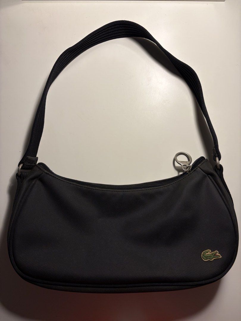 lacoste nylon hobo shoulder kili bag (Category: Shoulder Bags) located in Taytay. Submitted by beebopbelly (Listing ID 1468179061, Image 1). Description: authentic vintage lacoste nylon shoulder bag no issues, signs of use only due to age can fit a lot of stuff personal bag 📩 gcash to bank 🛵💨 J&T / lalamove 📍 taytay, rizal.