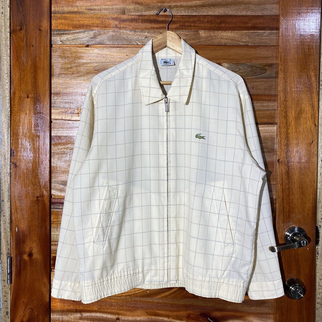 Lacoste Plaid Harrington Jacket (Category: Coats, Jackets and Outerwear) located in Andop. Submitted by rhouzze.ph24 (Listing ID 1468165640, Image 1). Description: OPEN FOR NEGOTIATION Name: Lacoste Dimensions: 23.5 by 27 Size: Medium Issue: Small ink stain in some ares, refer to the photos for the details.