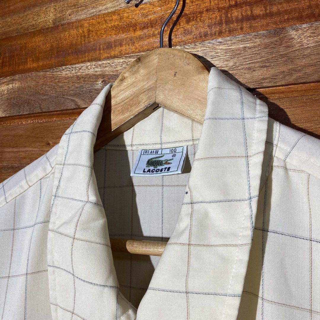 Lacoste Plaid Harrington Jacket (Category: Coats, Jackets and Outerwear) located in Andop. Submitted by rhouzze.ph24 (Listing ID 1468165640, Image 3). Description: OPEN FOR NEGOTIATION Name: Lacoste Dimensions: 23.5 by 27 Size: Medium Issue: Small ink stain in some ares, refer to the photos for the details.