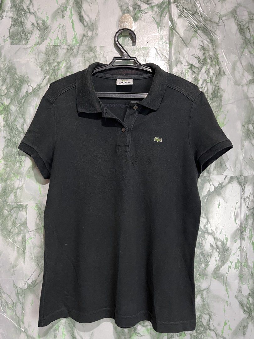 LACOSTE Polo Shirt Womens (Category: Luxury Apparel) located in Bulacan. Submitted by letsfindukaywithme (Listing ID 1468070283, Image 2). Description: Lacoste Polo Shirt Size 40 Fits Small Color: Black Minimal Issue: neck Still presentable +sf payment first Ship via J&T .
