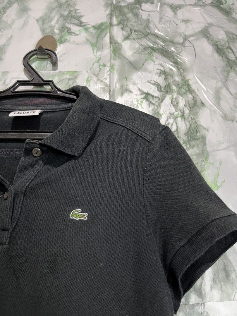 LACOSTE Polo Shirt Womens (Category: Luxury Apparel) located in Bulacan. Submitted by letsfindukaywithme (Listing ID 1468070283, Image 3). Description: Lacoste Polo Shirt Size 40 Fits Small Color: Black Minimal Issue: neck Still presentable +sf payment first Ship via J&T .