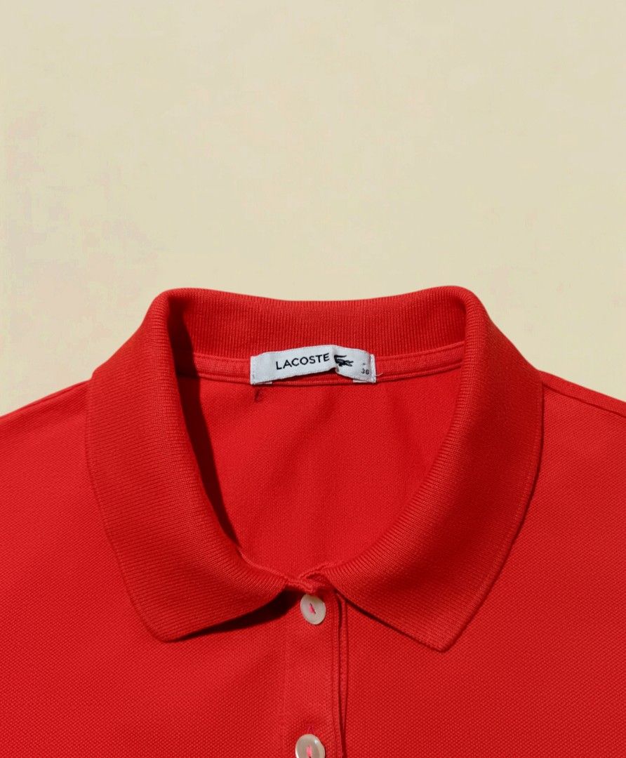Lacoste Red Polo Shirt Size 36 (Category: Tshirts & Polo Shirts ) located in Marikina City. Submitted by oldfits14 (Listing ID 1468232503, Image 3). Description: LACOSTE WOMEN'S POLO SHIRT (Orange) - 100% Legit/Authentic - Size 36 ▫️Color may vary due to lighting ▫️Dimes: 17 x 24.5'25 ▫️Color rate: 10/10 ▫️As New Condition ▫️Issue: Minimal Ink Stain ▫️Already washed .