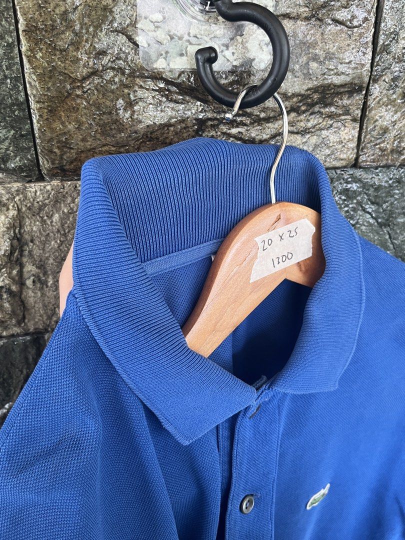 Lacoste Royal Blue Poloshirt (Category: Tshirts & Polo Shirts ) located in Cagayan de Oro. Submitted by curatedheirloomph_ (Listing ID 1468101290, Image 3). Description: 𝘿𝙞𝙢𝙚𝙣𝙨𝙞𝙤𝙣𝙨: 20x25 𝘽𝙚𝙨𝙩 𝙁𝙞𝙩: Small - Medium 𝘾𝙤𝙣𝙙𝙞𝙩𝙞𝙤𝙣 & 𝘾𝙤𝙡𝙤𝙧 𝙍𝙖𝙩𝙚: Excellent (9.5/10) 𝙄𝙨𝙨𝙪𝙚: Minimal signs of usage 𝘼𝙪𝙩𝙝𝙚𝙣𝙩𝙞𝙘𝙞𝙩𝙮 𝘿𝙚𝙘𝙡𝙖𝙧𝙖𝙩𝙞𝙤𝙣: Authentic.