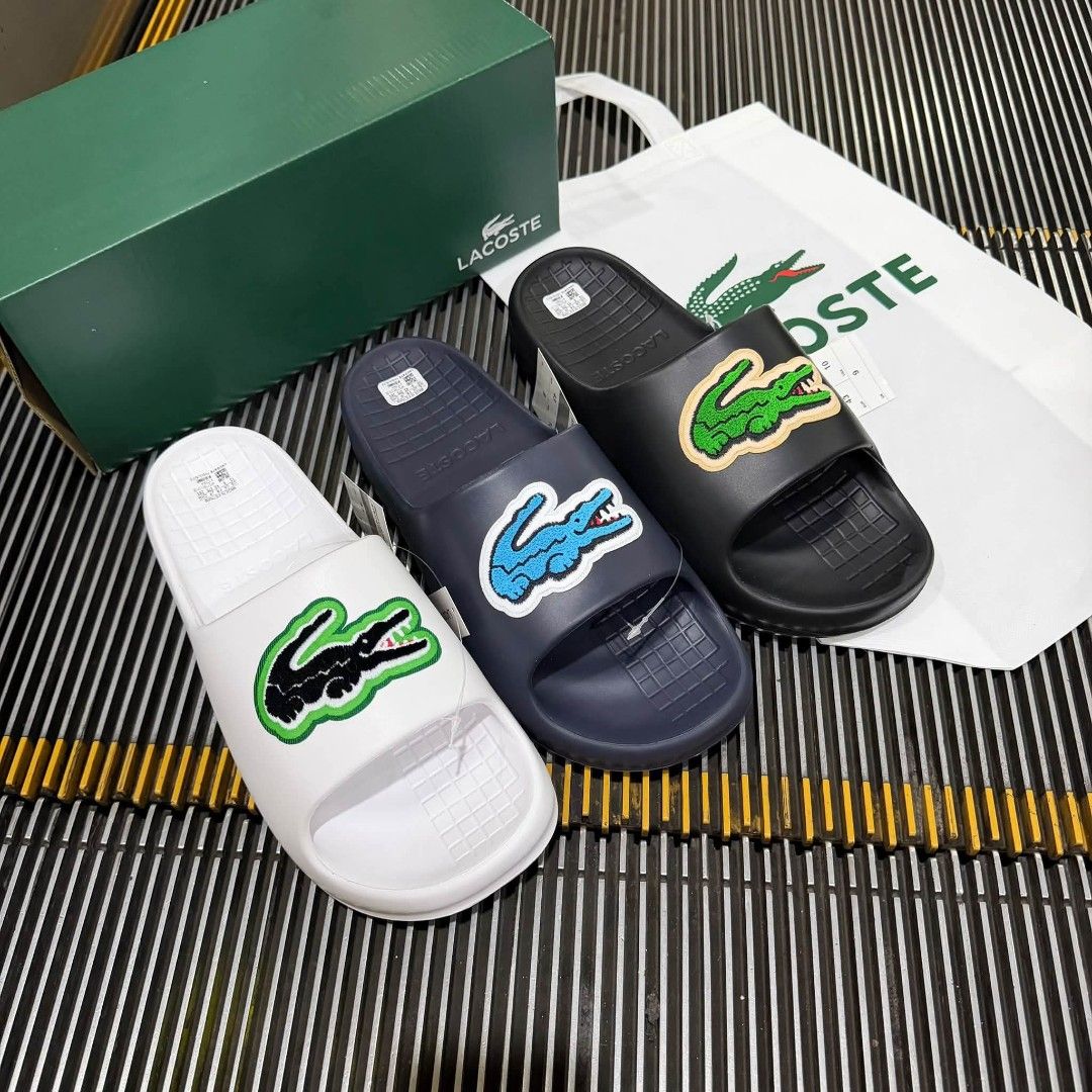Lacoste Serve Slide (Category: Slippers & Slides) located in Manila. Submitted by ddg_s (Listing ID 1468260661, Image 1). Description: AUTHENTIC MALL PULL OUT SIZE: 41 - 45 MENS SIZE.