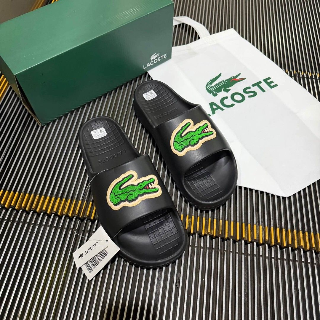 Lacoste Serve Slide (Category: Slippers & Slides) located in Manila. Submitted by ddg_s (Listing ID 1468260661, Image 2). Description: AUTHENTIC MALL PULL OUT SIZE: 41 - 45 MENS SIZE.