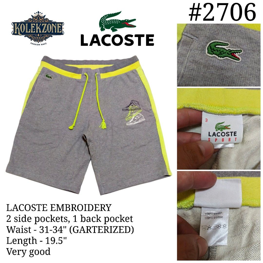 Lacoste Sport Grey Yellow Drawstring Shorts Size 3 (Category: Shorts) located in Nasugbu. Submitted by staffpicks1515 (Listing ID 1468223901, Image 1). Description: Grey Lacoste Sport shorts with vibrant yellow accents and drawstring waistband. Unique sneaker graphic printed on the right leg. Classic embroidered crocodile logo near the right pocket. Tagged size 3. Made from 100% cotton material. Includes two side pockets and one back pocket. Wais