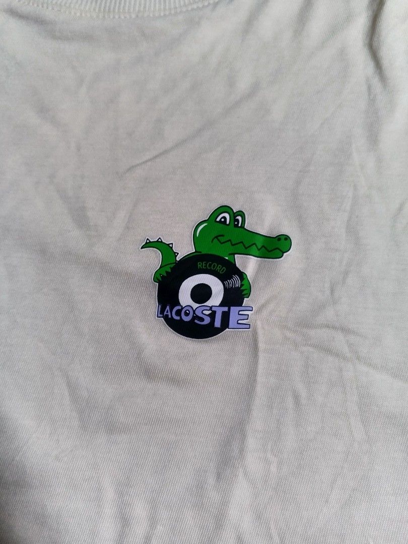 Lacoste Tshirt (Category: Tshirts & Polo Shirts ) located in Daraga. Submitted by trippythrifter (Listing ID 1468216041, Image 3). Description: nego check last image not noticeable pinhole🥲 need wash.