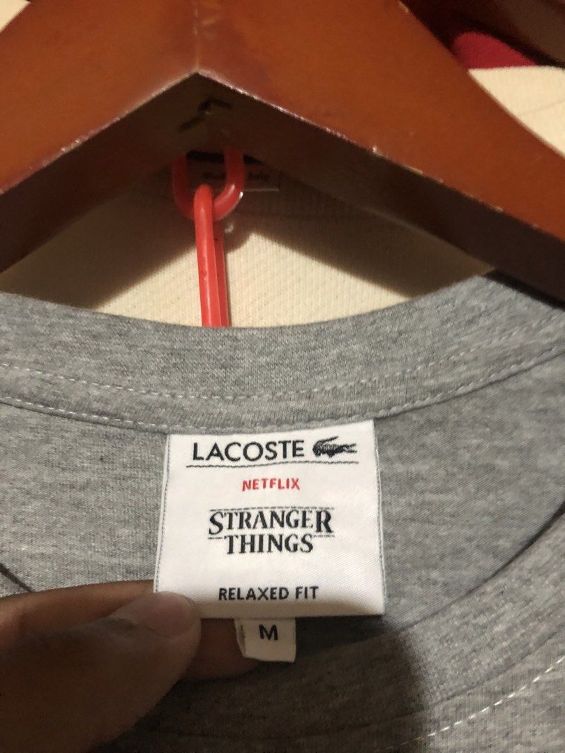 LACOSTE X NETFLIX SHIRT (Category: Tshirts & Polo Shirts ) located in Manila. Submitted by jazz_find5 (Listing ID 1468060671, Image 3). Description: LACOSTE X NETFLIX COLLAB SHIRT SIZE medium on tag 21,27 EXCELLENT ASNEW CONDITION.