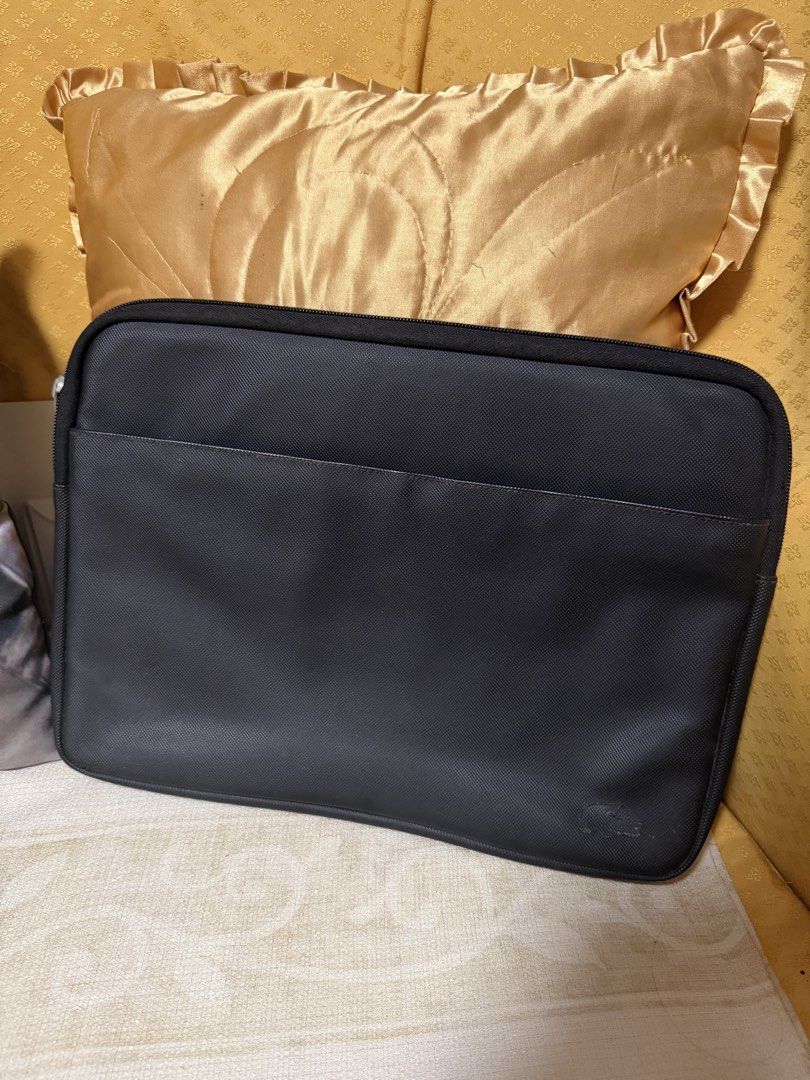 Laptop Bag (Category: Other Gadgets) located in San Pedro. Submitted by lovedbymeclothes (Listing ID 1468140479, Image 1). Description: lacoste 15” laptop bag logo was removed no zipper handle body is good condition.
