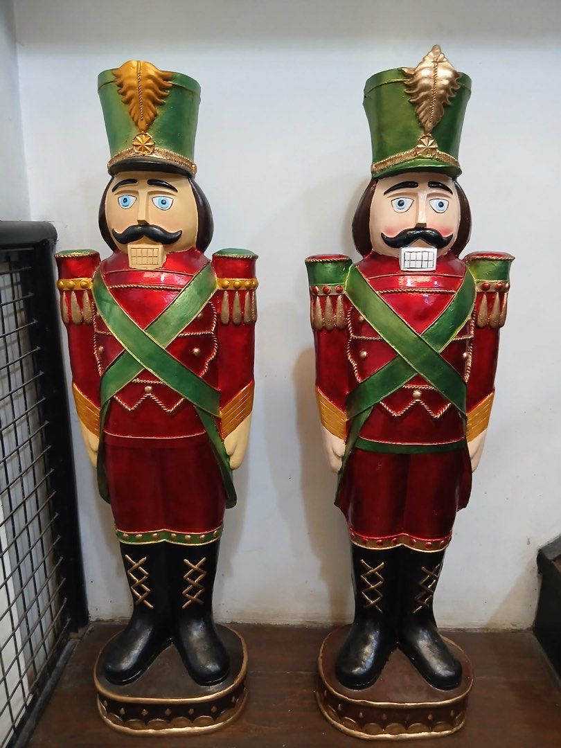 Large Christmas Nutcracker Soldier Statues Holiday Decor (Category: Figurines & Statues) located in San Juan City. Submitted by lynnlvshani (Listing ID 1468103601, Image 1). Description: - Set of 2 large holiday nutcracker soldier figures for 3k -4-feet tall - Painted in traditional red, green, gold, and black - Features detailed uniforms, tall hats, and boots - Solid circular bases for stable placement - Perfect festive decor for home, office, o