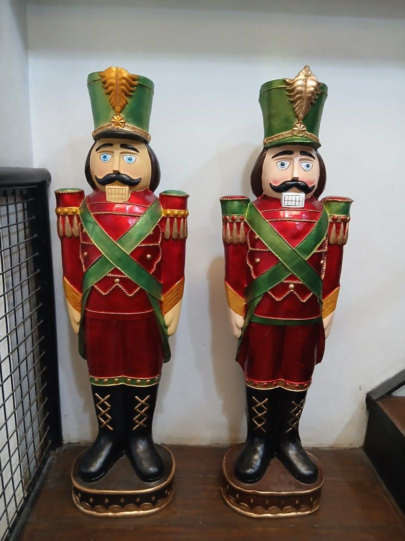 Large Christmas Nutcracker Soldier Statues Holiday Decor (Category: Figurines & Statues) located in San Juan City. Submitted by lynnlvshani (Listing ID 1468103601, Image 2). Description: - Set of 2 large holiday nutcracker soldier figures for 3k -4-feet tall - Painted in traditional red, green, gold, and black - Features detailed uniforms, tall hats, and boots - Solid circular bases for stable placement - Perfect festive decor for home, office, o