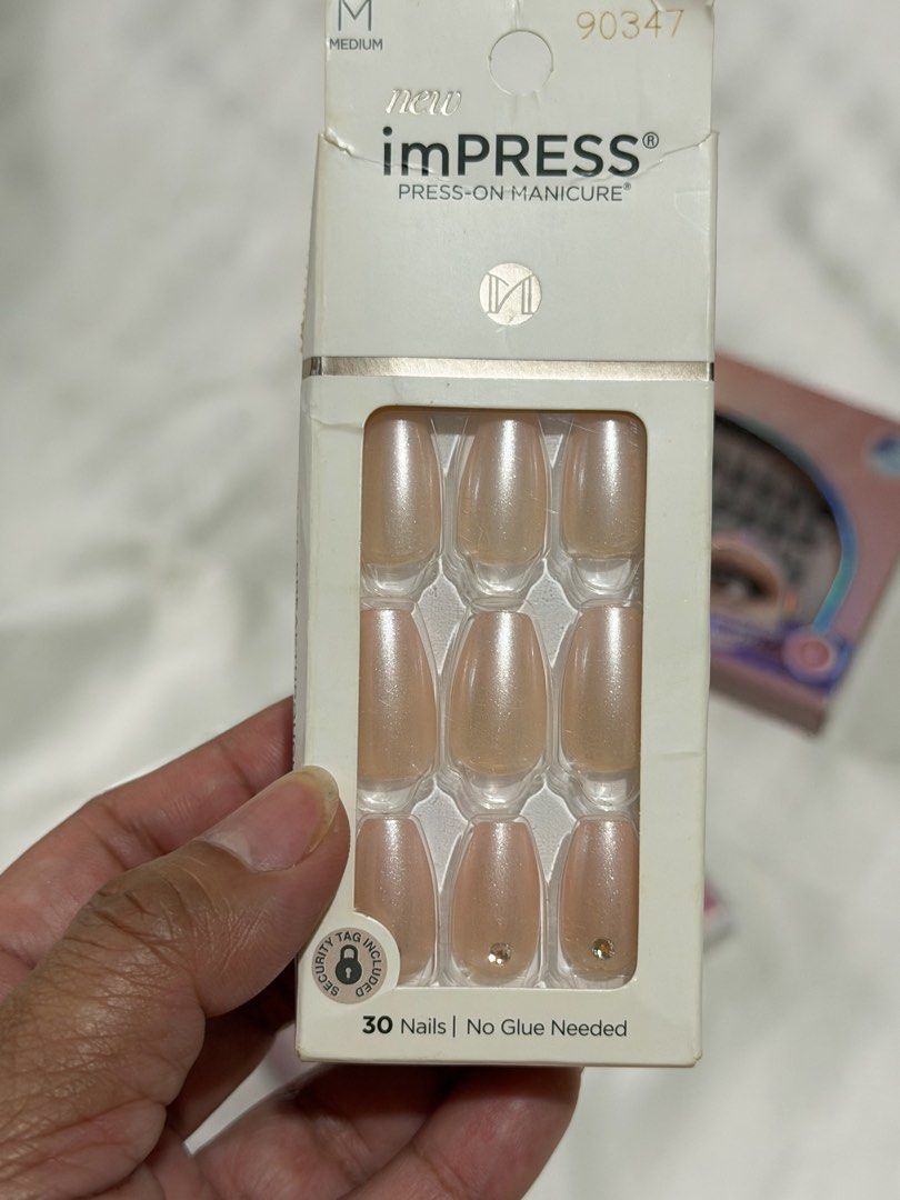 Lash and Nails Set (Sold as a Set) (Category: Hands & Nails) located in Pasig City. Submitted by paolasoriano_wind (Listing ID 1468152639, Image 2). Description: SOLD AS A SET ✨ - KISS imPress press-on nails (beautiful champagne color, 30 nails, vegan / cruelty-free, with prep pad, mini file and manicure stick. Pasalubong from the States. Unused and unopened. Box just has a tear at the back. - MLEN Diary Lashes “Exclusive Collab Series” (TRADITIO