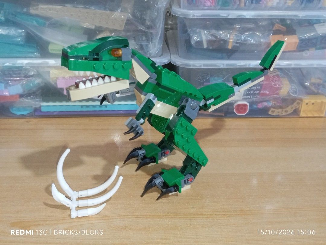 LEGO Creator Mighty Dinosaurs T-Rex 3-in-1 Set (Category: Lego & Building Sets) located in Manila. Submitted by jynxpedrin39963 (Listing ID 1468218038, Image 1). Description: - Fully assembled Green LEGO T-Rex ready for display - Articulated joints in the legs, tail, and jaw for custom posing - Includes buildable prey skeleton ribcage accessory - Built carefully from original set with clean bricks - Perfect for dinosaur fans and brick collectors.