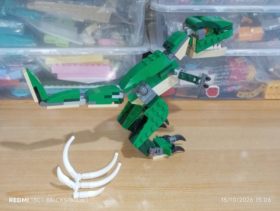 LEGO Creator Mighty Dinosaurs T-Rex 3-in-1 Set (Category: Lego & Building Sets) located in Manila. Submitted by jynxpedrin39963 (Listing ID 1468218038, Image 2). Description: - Fully assembled Green LEGO T-Rex ready for display - Articulated joints in the legs, tail, and jaw for custom posing - Includes buildable prey skeleton ribcage accessory - Built carefully from original set with clean bricks - Perfect for dinosaur fans and brick collectors.