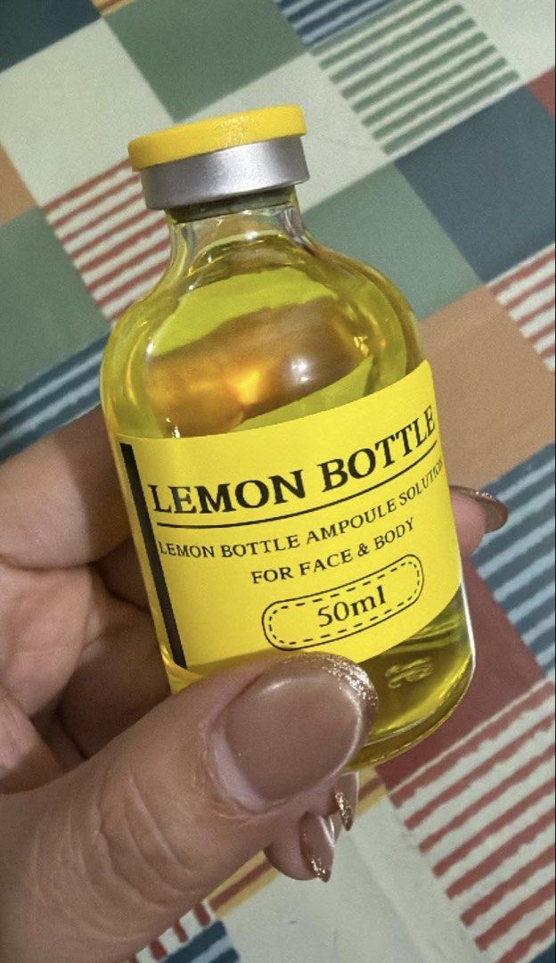 Lemon Bottle for Face & Body 50ml (Category: Face Care) located in Pasig City. Submitted by preloved_items_roche (Listing ID 1468189351, Image 2). Description: - Chongsan Lemon Bottle Solution - Brand new and unopened box with complete manufacturing and expiry details - Contains 10 pieces per box, 50ml net content each - Formulated for both face and body use - Features yellow liquid in clear glass bottles with a yellow cap - Ready stock, fast shi
