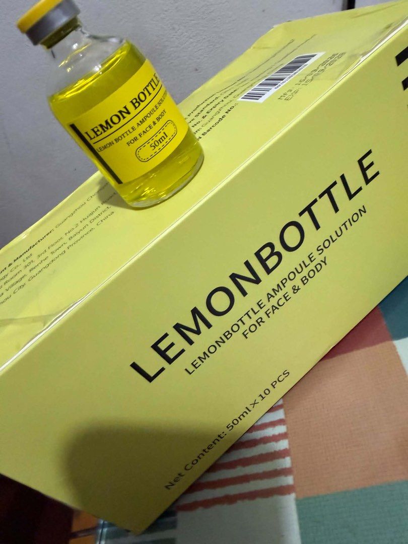 Lemon Bottle for Face & Body 50ml (Category: Face Care) located in Pasig City. Submitted by preloved_items_roche (Listing ID 1468189351, Image 1). Description: - Chongsan Lemon Bottle Solution - Brand new and unopened box with complete manufacturing and expiry details - Contains 10 pieces per box, 50ml net content each - Formulated for both face and body use - Features yellow liquid in clear glass bottles with a yellow cap - Ready stock, fast shi