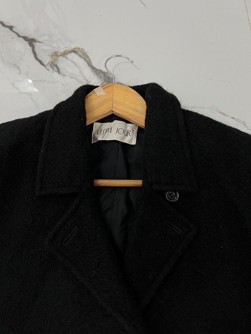 LENA JOUR Black Wool Bomber cropped Jacket (Category: Coats, Jackets and Outerwear) located in Baguio. Submitted by pureearth.5f1c08 (Listing ID 1468076867, Image 2). Description: - Brand: LENA JOUR -size xs-s - Style: Classic vintage double-breasted wool jacket - Closure: Button front with lapel collar - Details: Ribbed knit hem and cuffs with textured fabric finish - Lining: Fully lined with black inner lining - Condition: Excellent.