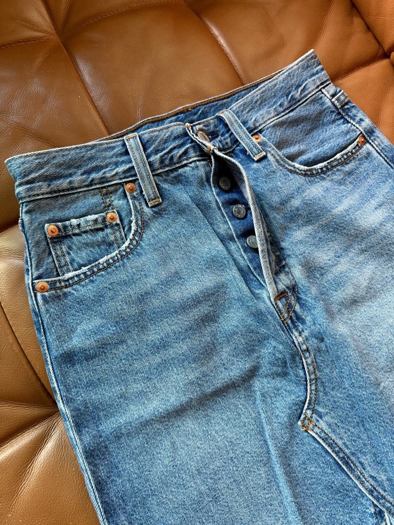Levi's Long Denim Midi Skirt (Category: Skirts) located in Pasig City. Submitted by hellolala.94 (Listing ID 1468136508, Image 1). Description: Levi’s Long Denim Midi Skirt Raw Hem W 25.