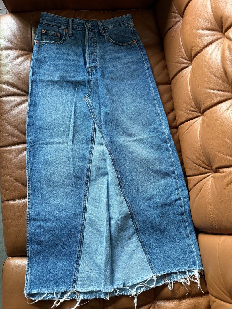 Levi's Long Denim Midi Skirt (Category: Skirts) located in Pasig City. Submitted by hellolala.94 (Listing ID 1468136508, Image 3). Description: Levi’s Long Denim Midi Skirt Raw Hem W 25.