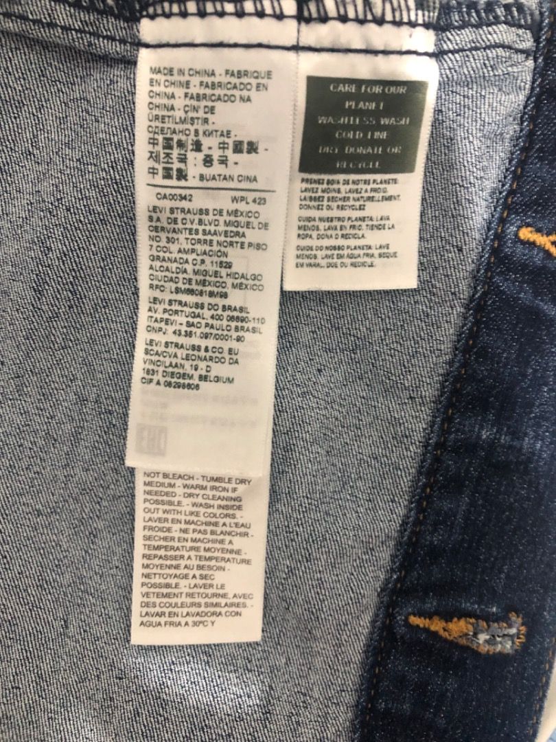 Levi's Premium Denim Jacket Size S (Category: Coats, Jackets and Outerwear) located in Manila. Submitted by kissa.1890 (Listing ID 1468195070, Image 3). Description: - Brand: Levi's Premium - Style: Classic blue wash denim jacket - Size: Small - Details: Metal button closure, chest flap pockets, and side welt pockets - Condition: Interior leather patch and care tags intact - Origin: Made in China - Perfect staple piece for layering.