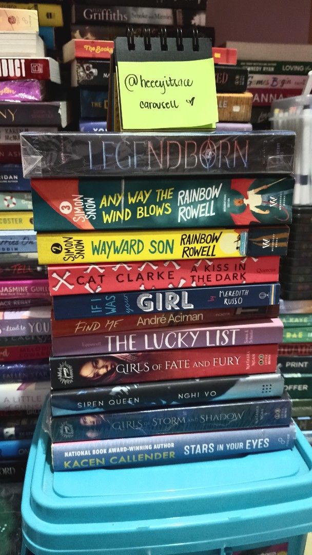 LGBT Themed Bundle (Category: Storybooks) located in Calamba. Submitted by heeeyitsace (Listing ID 1468101025, Image 1). Description: - YA Fiction Novel Stack - Titles: Legendborn, Any Way The Wind Blows, Wayward Son, A Kiss in the Dark, If I Was Your Girl, Find Me, The Lucky List, Girls of Fate and Fury, Siren Queen, Girls of Storm and Shadow, Stars in Your Eyes - Condition: Mix of brand new (wrapped in plastic) and preloved - Format: Mix of pap