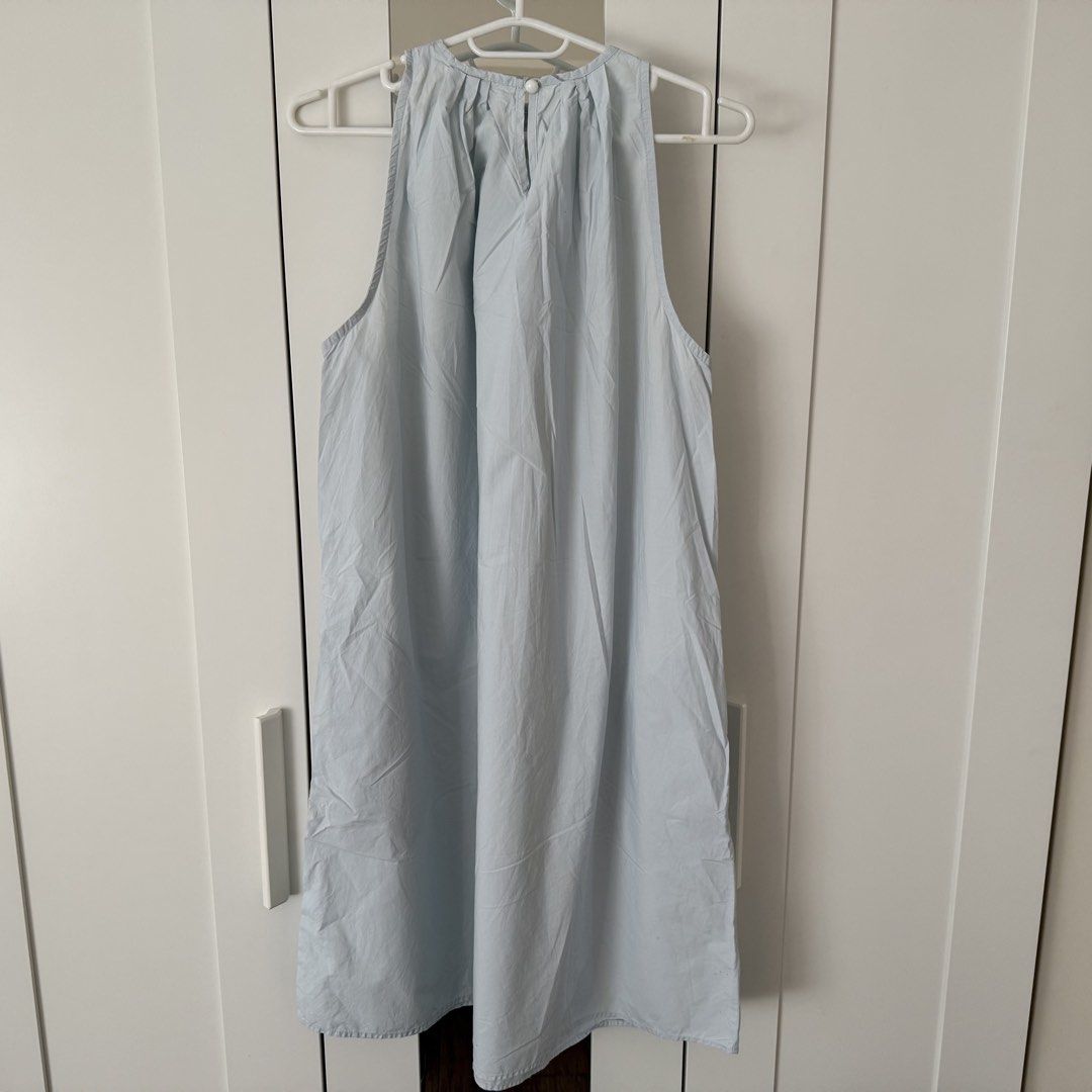 Light blue halter neck midi dress with pockets (Category: Dresses) located in Marikina City. Submitted by lovegoeson (Listing ID 1468068762, Image 2). Description: - Color: Light blue - Style: Halter neckline with back button closure and pleated collar - Length: Mid-calf midi dress with a relaxed, flowy silhouette - Features: Practical side pockets - Condition: like new, once used - Best for: Easy, casual warm-weather styling.