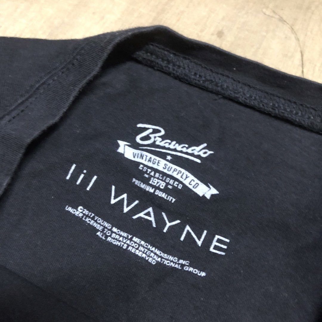 Lil Wayne Bravado Vintage Supply Co Graphic Tee (Category: Tshirts & Polo Shirts ) located in Dasmarinas. Submitted by johnlloydm99208 (Listing ID 1468260352, Image 3). Description: - Brand: Bravado Vintage Supply Co. (Manufactured by ACSENSE) - Artist/Design: Lil Wayne with currency graphic and 'Take It Out Your Pocket And Show It' text - Size: Medium - Color: Black - Authenticity: Official 2017 Young Money Merchandising interior collar print - 