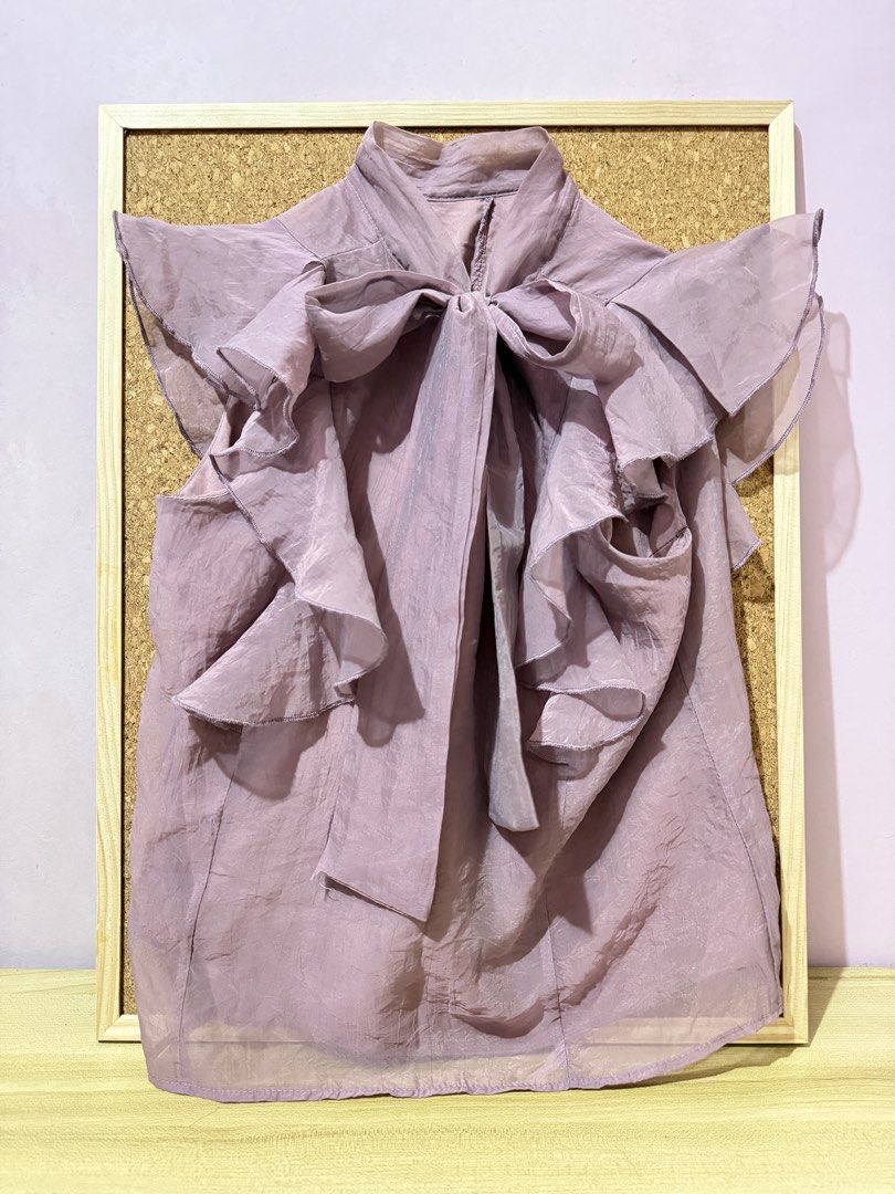 Lilac Ruffle Blouse (Category: Blouses) located in Caloocan City. Submitted by elalaaaa (Listing ID 1468230178, Image 1). Description: .