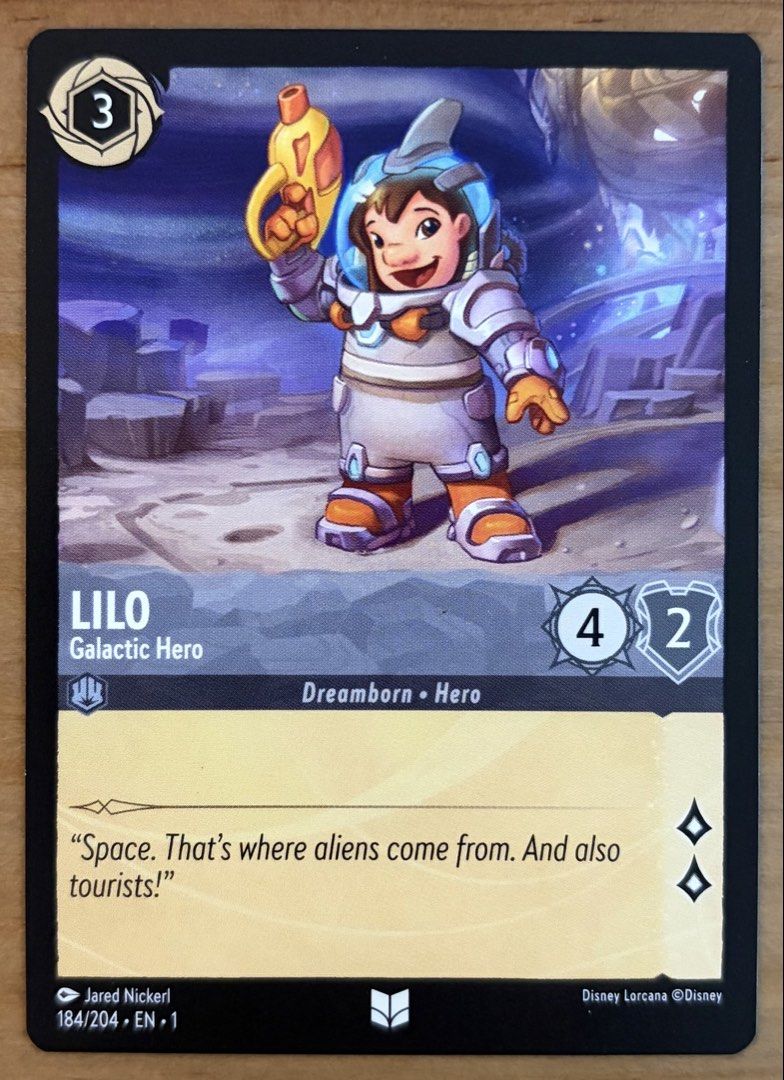 Lilo - Galactic Hero | Disney Lorcana Cards ~ The First Chapter (Category: Raw Singles) located in Makati City. Submitted by cardlab (Listing ID 1468082610, Image 1). Description: Items are 💯 authentic/original/legit. About The Card: •Language: EN • Number: 184/204 • Uncommon • Normal FOR: • Cards ₱99 and below with Card Sleeves • Cards ₱100 and up with Card Sleeves and Used Toploader • ₱10 for Bnew Tops Packaging (If Shipping): ✔️ Plastic cover