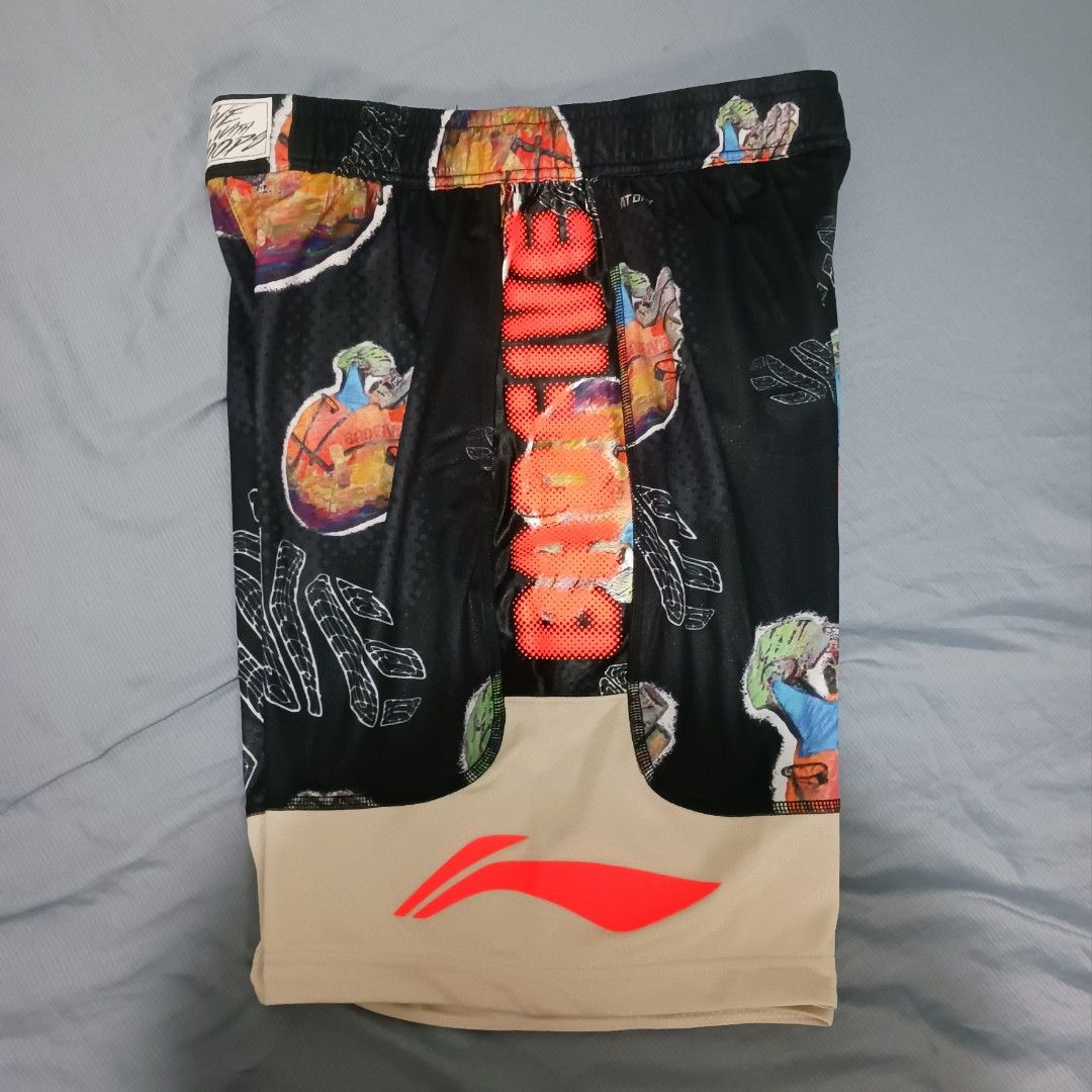 Li-Ning Badfive Shorts (Size L) (Category: Shorts) located in Imus. Submitted by kctrey (Listing ID 1468130772, Image 3). Description: - Brand: Li-Ning Badfive - Size: L (175/80A) - Condition: Brand new with original tags attached, never worn - Design: Bold all-over graphic print in a black and tan colorway - Details: Large Badfive branding down the front and Li-Ning logo on the hem - Versatility: Great for basketball court sessions or casual str