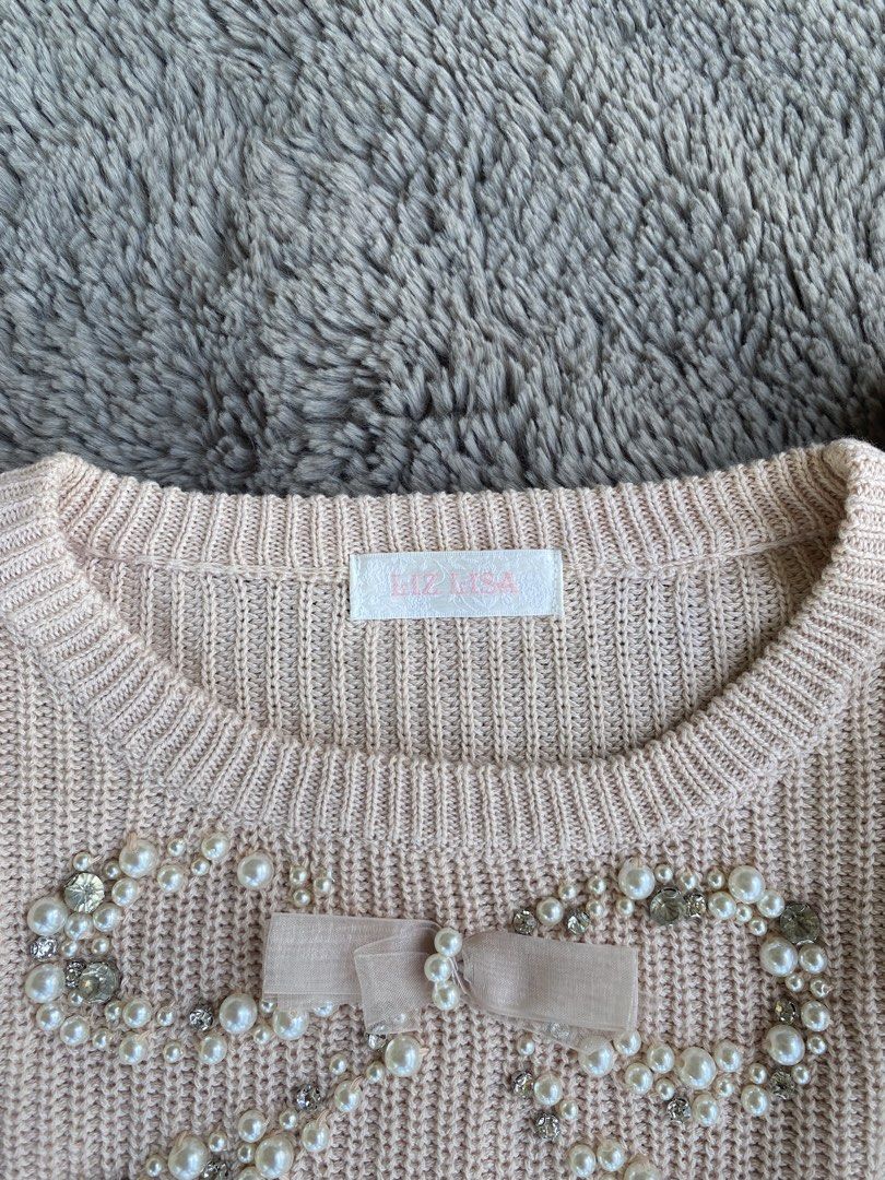 Liz Lisa Pink Knit Top (Category: Blouses) located in Pozorrubio. Submitted by eyannn. (Listing ID 1468086160, Image 3). Description: Prestine/ As New Condition✨ Color rate 9.8/10 Issue: None❌ width: 15 length: 17.