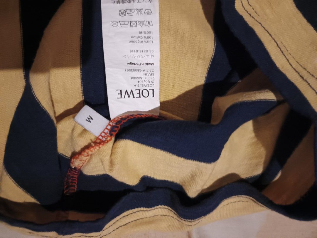 Loewe stripe tshirt (Category: Activewear) located in Odiongan. Submitted by thriftngo26 (Listing ID 1468202767, Image 3). Description: The image shows a multicolour cotton striped t-shirt with a Loewe label on the inner collar..