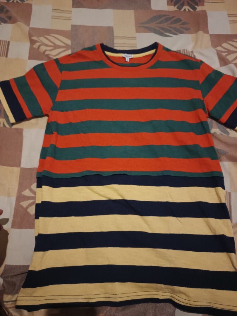 Loewe stripe tshirt (Category: Activewear) located in Odiongan. Submitted by thriftngo26 (Listing ID 1468202767, Image 1). Description: The image shows a multicolour cotton striped t-shirt with a Loewe label on the inner collar..