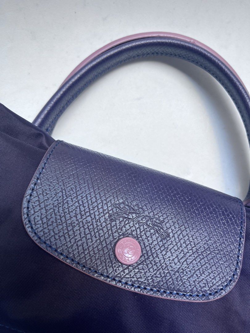 Longchamp (Category: Tote Bags) located in Dagupan City. Submitted by calmocean-f675cc (Listing ID 1468143445, Image 3). Description: Longchamp Authentic Excellent condition Color violet 1699 add sf .