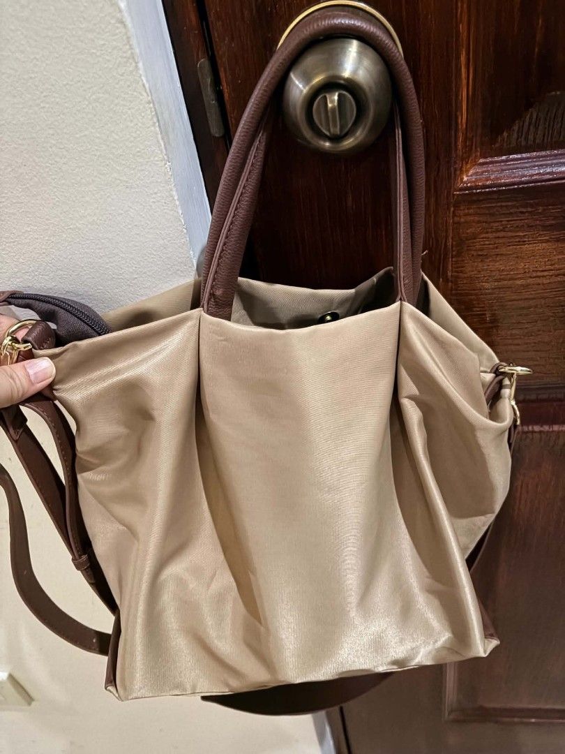 Longchamp and Legato (Category: Tote Bags) located in Bulacan. Submitted by watwatismyname (Listing ID 1468165242, Image 2). Description: 500 each Longchamp Le Pilage Energy S Handbag and Shoulder in Green Army Color (large) Legato Largo 2-way lightweight shoulder and handbag in beige (medium) message for issues.