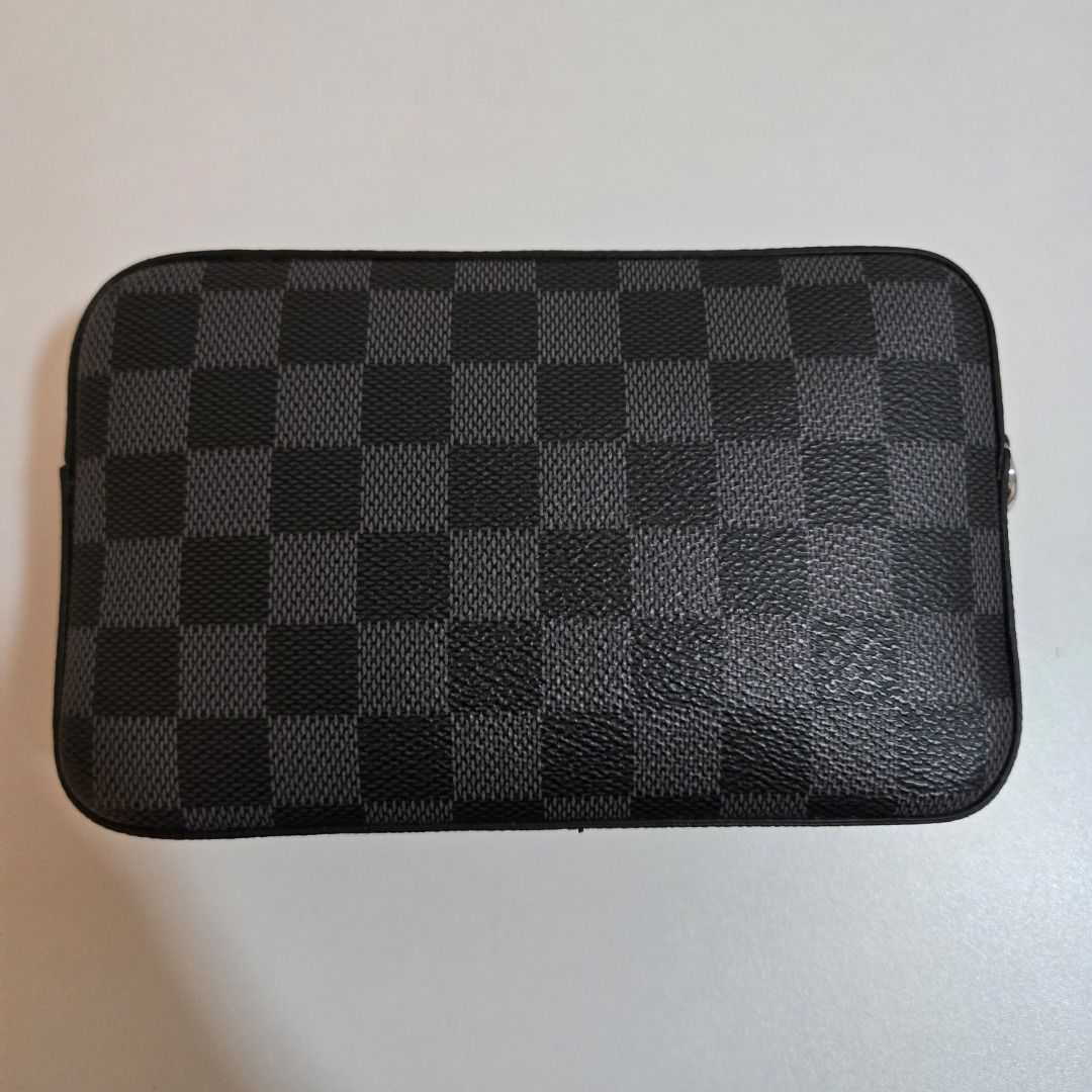 Louis Vuitton Alpha Wearable Wallet (Category: Luxury Bags & Wallets) located in Muntinlupa City. Submitted by luxor.alt123158 (Listing ID 1468227273, Image 2). Description: - Brand: Louis Vuitton - Style: Double Zip Pochette - Material: Iconic Damier Graphite canvas with black leather trim - Hardware: Silver-tone - Closure: Top zip closure - Interior: Clean lining with heat stamp, features multiple card slots and compartments - Condition: Guaran