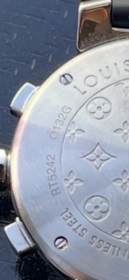 Louis Vuitton Cup Chronograph Watch Black Rubber Strap (Category: Luxury Watches) located in Manila. Submitted by zackthrift16 (Listing ID 1468208562, Image 3). Description: - Model: Louis Vuitton Cup Chronograph - Dial: Blue with white numbers, sub-dials, and date window - Strap: Black rubber with embossed LV monogram pattern - Case Back: Stainless steel with serial numbers RT5242 and 0132G, plus Swiss Made markings - Movement: Chronograph with 