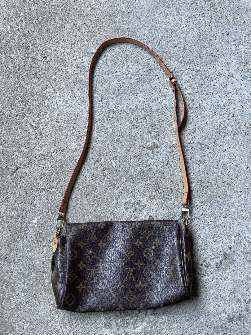 Louis Vuitton Monogram Canvas Crossbody Bag with Strap (Category: Luxury Bags & Wallets) located in Siniloan. Submitted by rethr1ft (Listing ID 1468085701, Image 2). Description: - Authentic Louis Vuitton crossbody bag in classic brown monogram canvas - Adjustable leather shoulder strap with gold-tone hardware - Secure front flap closure with engraved metal plaque - Condition: Visible wear along corner edges and light scratching on the metal plaq