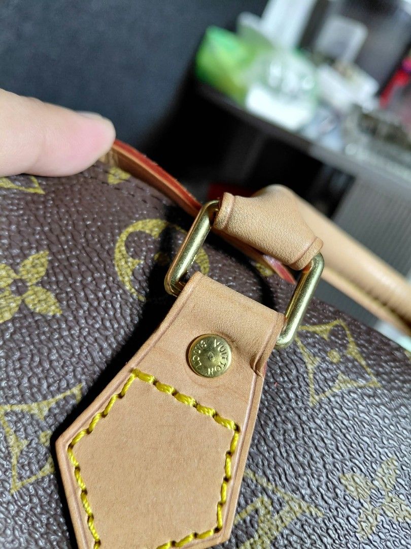 Louis Vuitton Monogram Canvas Speedy Handbag (Category: Luxury Bags & Wallets) located in Baguio. Submitted by angeloshoppebaguio2600 (Listing ID 1468133003, Image 3). Description: - Louis Vuitton with classic Monogram canvas pattern - Vachetta leather handles and trim with signature yellow stitching - Shiny gold-tone hardware stamped with Louis Vuitton - Secure zipper closure with leather pull tab - Clean brown textile lining inside - RUSH SALE 