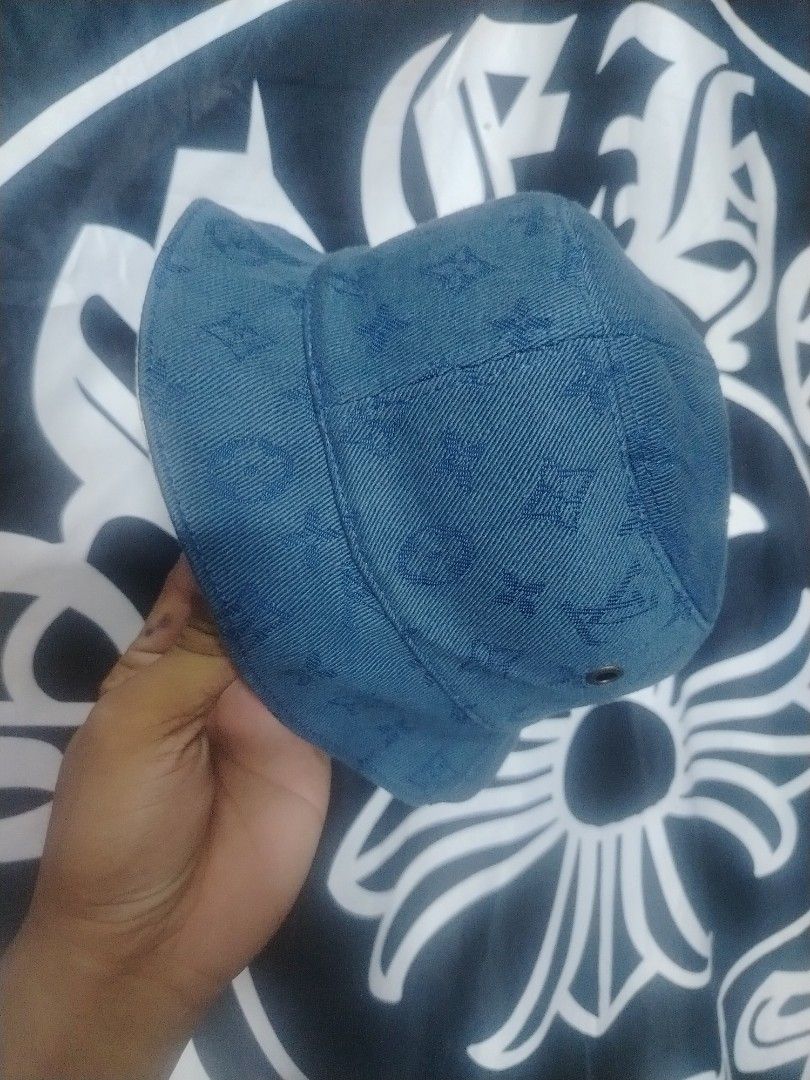 Louis Vuitton monogram hat (Category: Caps & Hats) located in Roxas City. Submitted by hd_thriftshop (Listing ID 1468202985, Image 3). Description: blue denim bucket hat featuring an all-over embossed Louis Vuitton monogram pattern, which resembles the Louis Vuitton Monogram Denim Bucket Hat or related styles like the Monogram Essential or Reversible Bob hat.