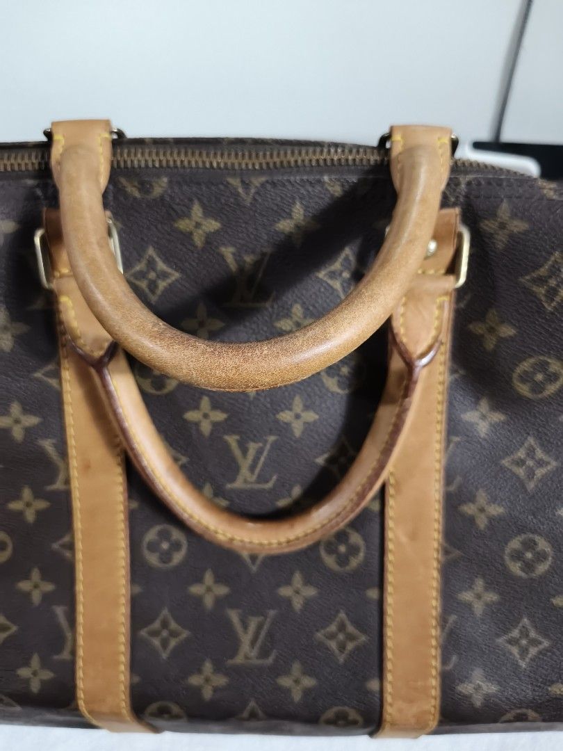 Louis Vuitton Monogram Keepall 55 with ENTRUPY (Category: Luxury Bags & Wallets) located in Paranaque City. Submitted by bagdbags (Listing ID 1468139991, Image 3). Description: Louis Vuitton Keepall 55 Duffle Bag in good used condition..