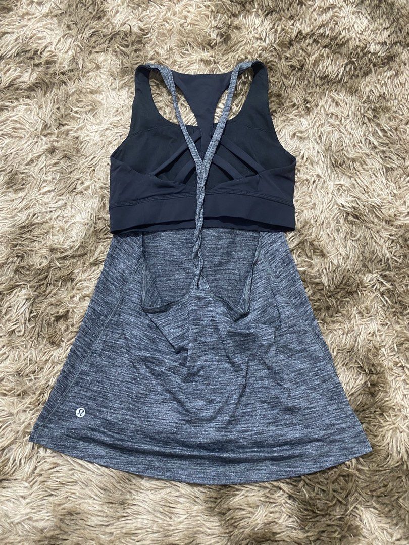 Lululemon Athletica Layered Tank Top Size 6 (Category: Sleeveless) located in Cagayan de Oro. Submitted by sepamorash53558 (Listing ID 1468263789, Image 2). Description: - Brand: Lululemon - Size: 6 (tag attached) - Color: Grey heather and black - Design: Built-in bra with a trendy strappy back - Material: Lightweight and breathable fabric - Details: Classic white Lululemon logo printed near the bottom hem - Condition: Clean, well-kept athletic w