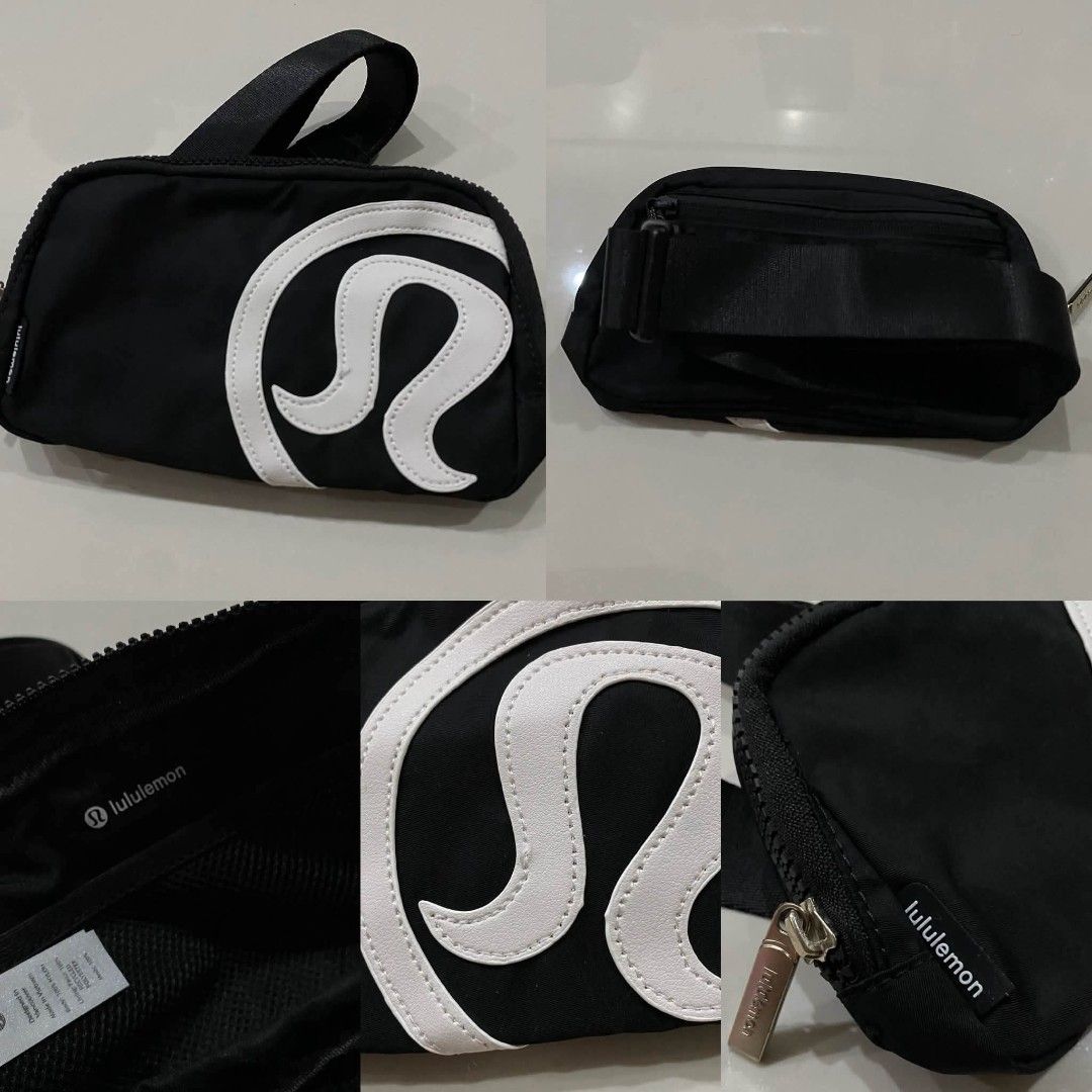 Lululemon Black and White Logo Belt Bag (Category: Belt bags, Clutches and Pouches) located in Quezon City. Submitted by camilla23 (Listing ID 1468085144, Image 1). Description: - Authentic black Lululemon belt bag - Features a large white curved logo applique on the front - Adjustable black strap with secure buckle closure - Zippered main compartment and back pocket with Lululemon branded pull tabs - Material breakdown tag intact inside - Super 