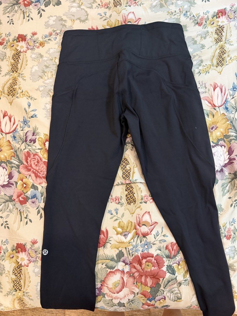 Lululemon Black Leggings Size 8 (Category: Activewear) located in Manila. Submitted by bellafleur (Listing ID 1468195977, Image 2). Description: - Brand: Lululemon - Color: Classic Black - Size: 8 - Material: Premium nylon and lycra blend (super stretchy and comfy) - Features: Convenient side pockets on both thighs and signature Lulu logo on the lower back leg - Condition: Excellent / Wash instructions on inner tag - Best for: Workouts, running, 