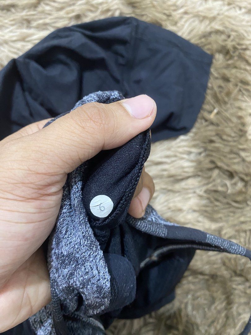 Lululemon Black Tank Top Size 6 (Category: Sleeveless) located in Cagayan de Oro. Submitted by sepamorash53558 (Listing ID 1468222815, Image 3). Description: - Brand: Lululemon - Style: Athletic tank top with built-in bra - Color: Black with grey patterned bra - Size: 6 (printed tag) - Design: Racerback with double strap detail and signature logo stamp - Condition: Great, ideal for gym workouts or casual wear.