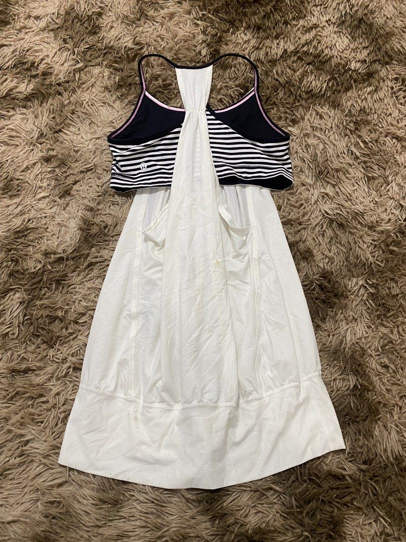 Lululemon Black White Striped Tank Top Size 8 (Category: Sleeveless) located in Cagayan de Oro. Submitted by sepamorash53558 (Listing ID 1468264304, Image 2). Description: - Brand: Lululemon - Style: Athletic tank top with built-in black and white striped bra - Features: Racerback design, pink trim details, and iconic silver omega logo - Size: 8 - Condition: Pre-loved with some noticeable light stains on the white fabric section.