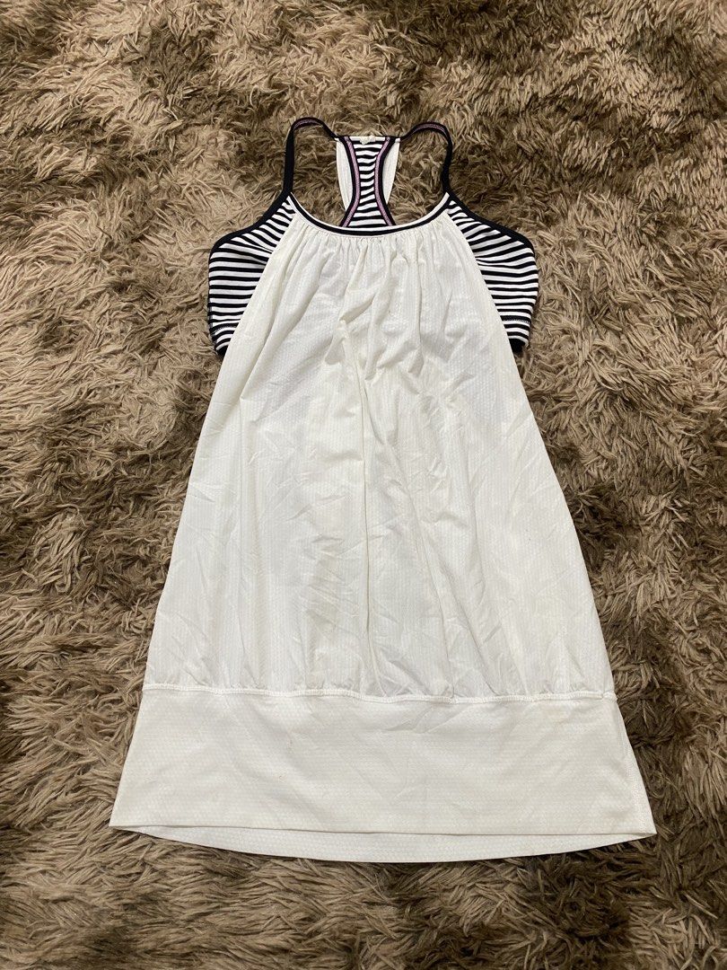 Lululemon Black White Striped Tank Top Size 8 (Category: Sleeveless) located in Cagayan de Oro. Submitted by sepamorash53558 (Listing ID 1468264304, Image 1). Description: - Brand: Lululemon - Style: Athletic tank top with built-in black and white striped bra - Features: Racerback design, pink trim details, and iconic silver omega logo - Size: 8 - Condition: Pre-loved with some noticeable light stains on the white fabric section.