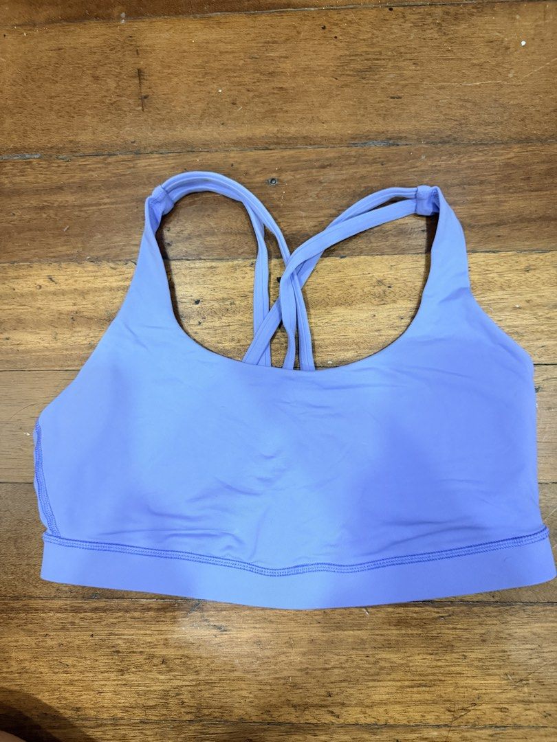 Lululemon Energy Bra (8) (Category: Activewear) located in Quezon City. Submitted by bonkee_declutters (Listing ID 1468203297, Image 3). Description: Lululemon Energy bra in shade of lavender purple. NOT UKAY. This is my personal item. Bought from Singapore store. Multiple thin straps cross over the back for a stylish look and secure hold. Iconic reflective silver Lululemon logo stamped on the lower back band. Breathable mesh paneling between the
